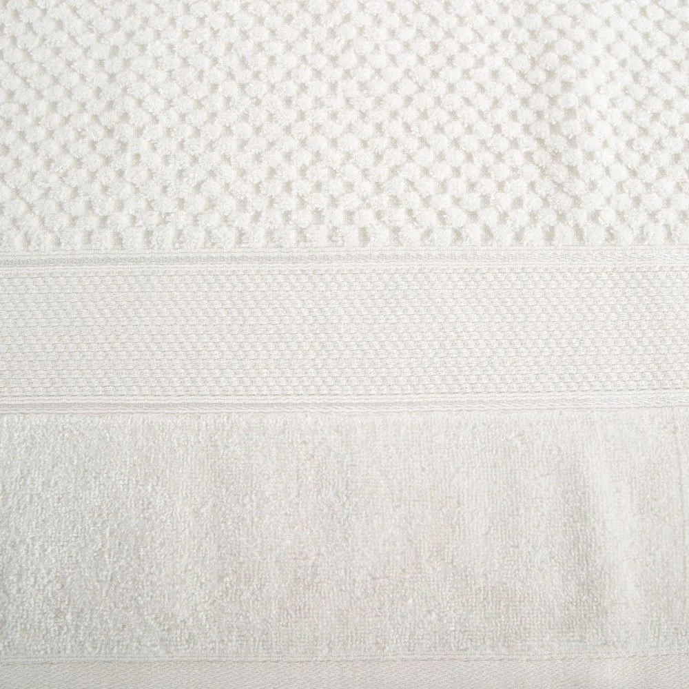 Ręcznik Jessi 50x90 kremowy frotte 500g/m2 z fakturą wytłaczanej krateczki i welurową bordiurą Eurofirany