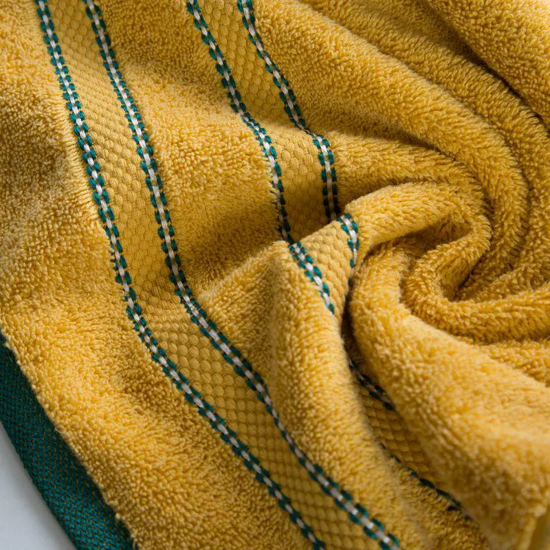 Ręcznik 50x90 Kristi  musztardowy z ozdobną bordiurą w pasy frotte 500g/m2 Eurofirany