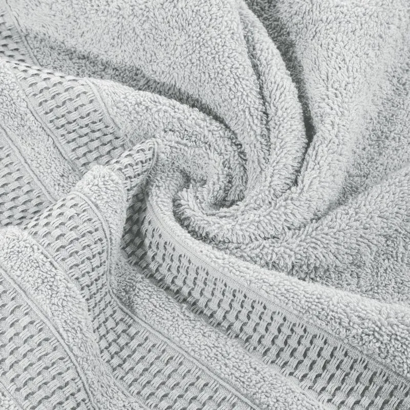 Ręcznik 50x90 Nastia srebrny z żakardową bordiurą w pasy w stylu eko frotte 500 g/m2 Eurofirany