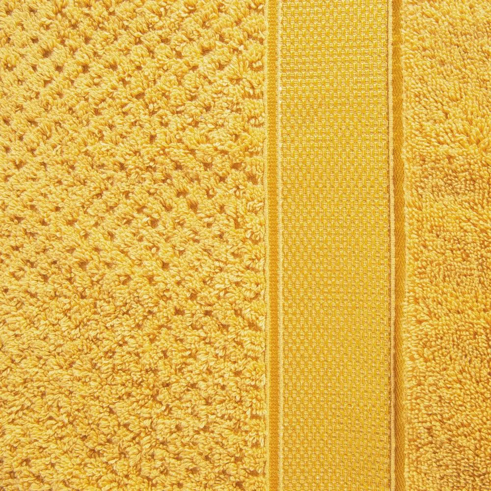 Ręcznik Milan 50x90 musztardowy frotte 500m/g2 bawełniany z bordiurą przetykaną błyszczącą nicią Eurofirany