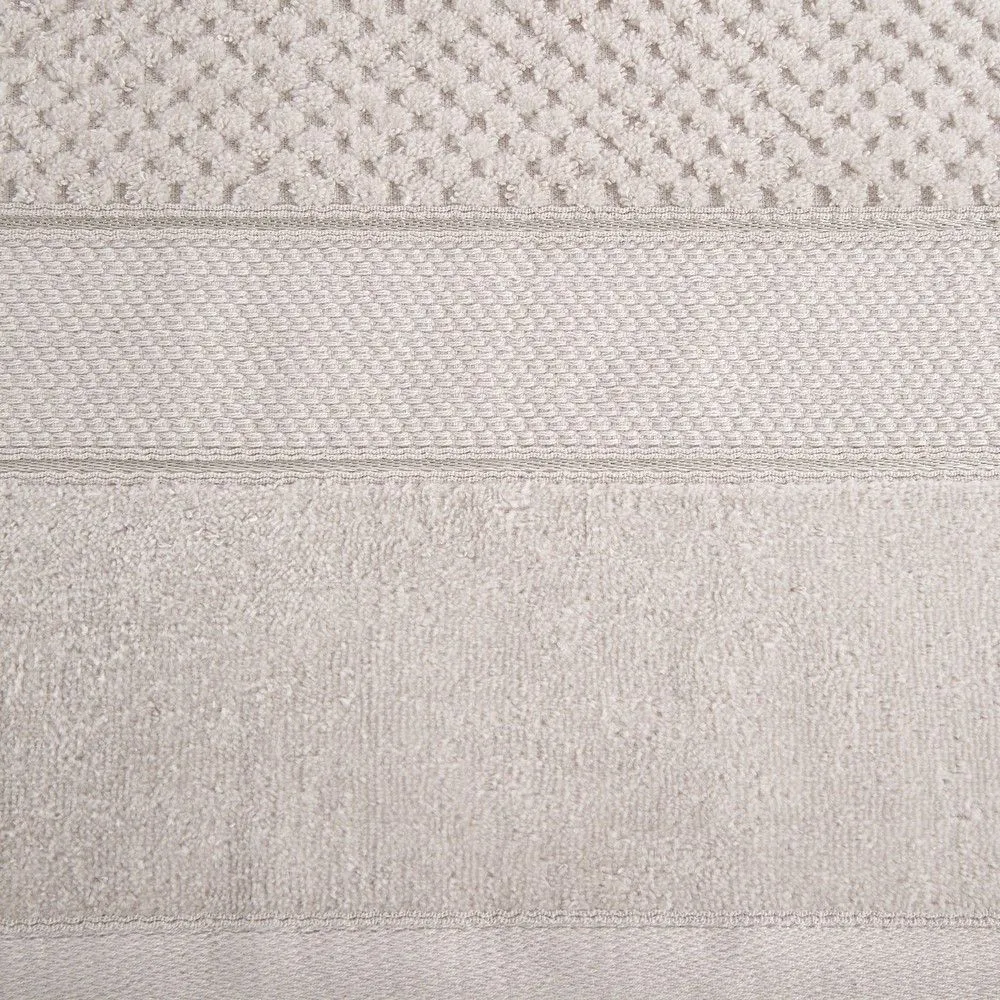 Ręcznik Jessi 50x90 beżowy frotte 500g/m2 z fakturą wytłaczanej krateczki i welurową bordiurą Eurofirany