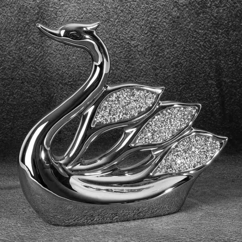 Figurka dekoracyjna Palmera 27x8x26  łabądż srebrna Eurofirany